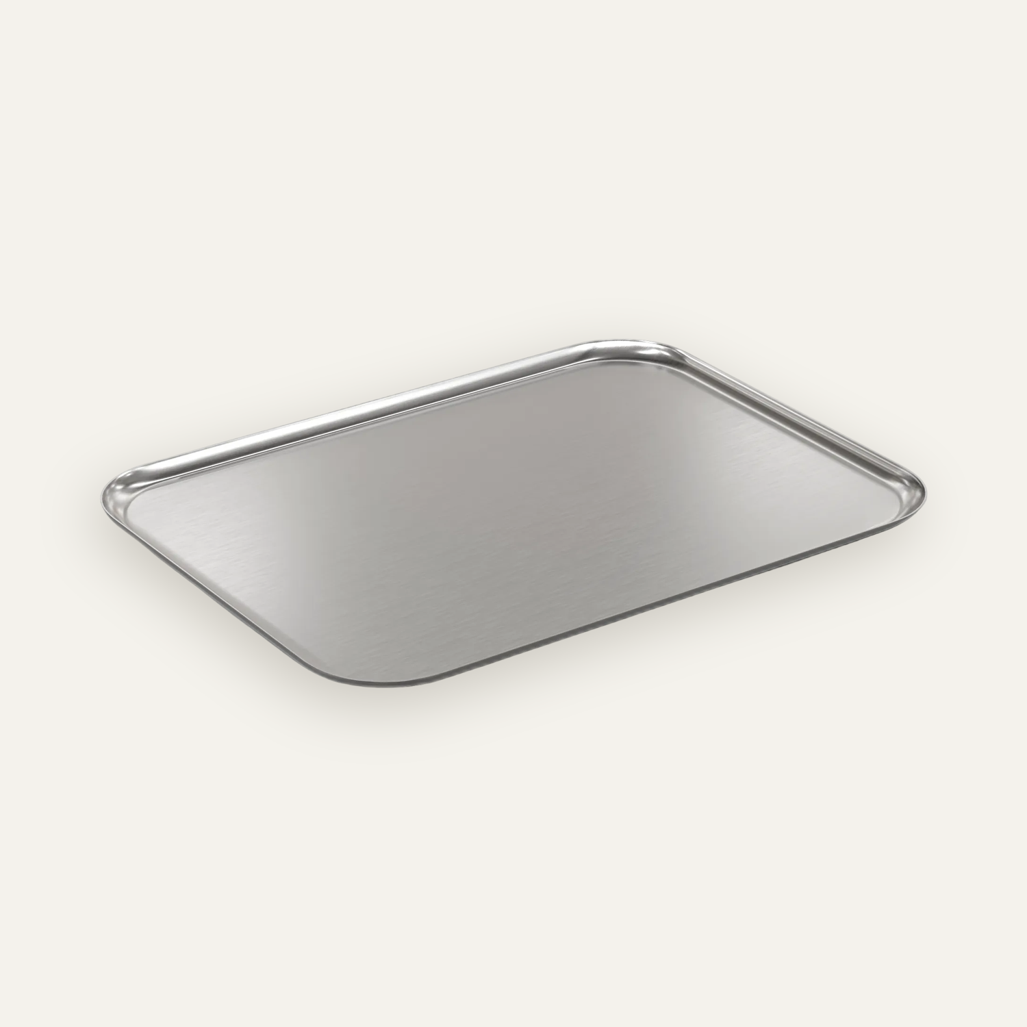 Brushed stainless steel serving tray, large, on cream backdrop with soft shadow