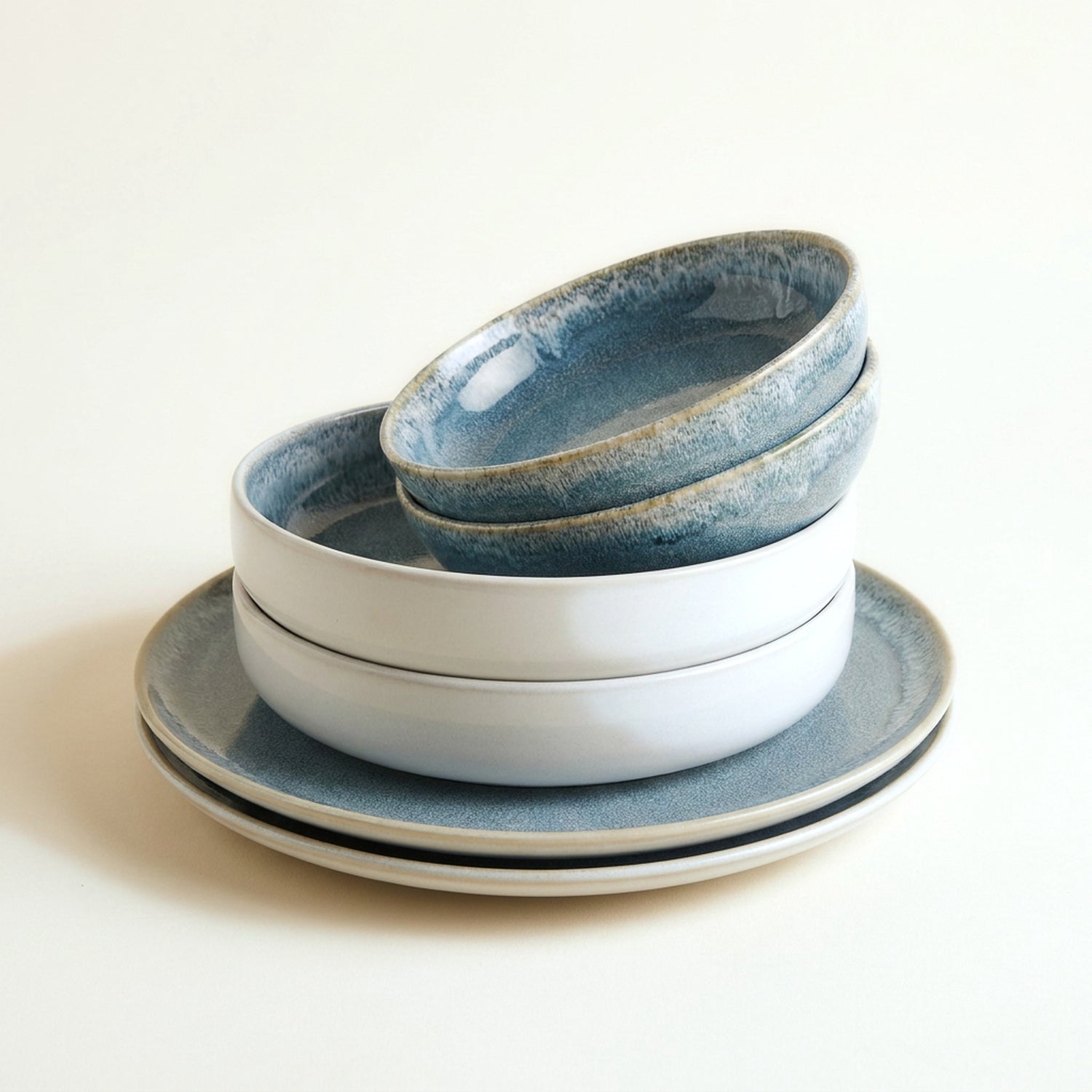Table for Two set — six pieces of hand-glazed teal stoneware, stacked: two large plates, two deep plates, two dessert plates